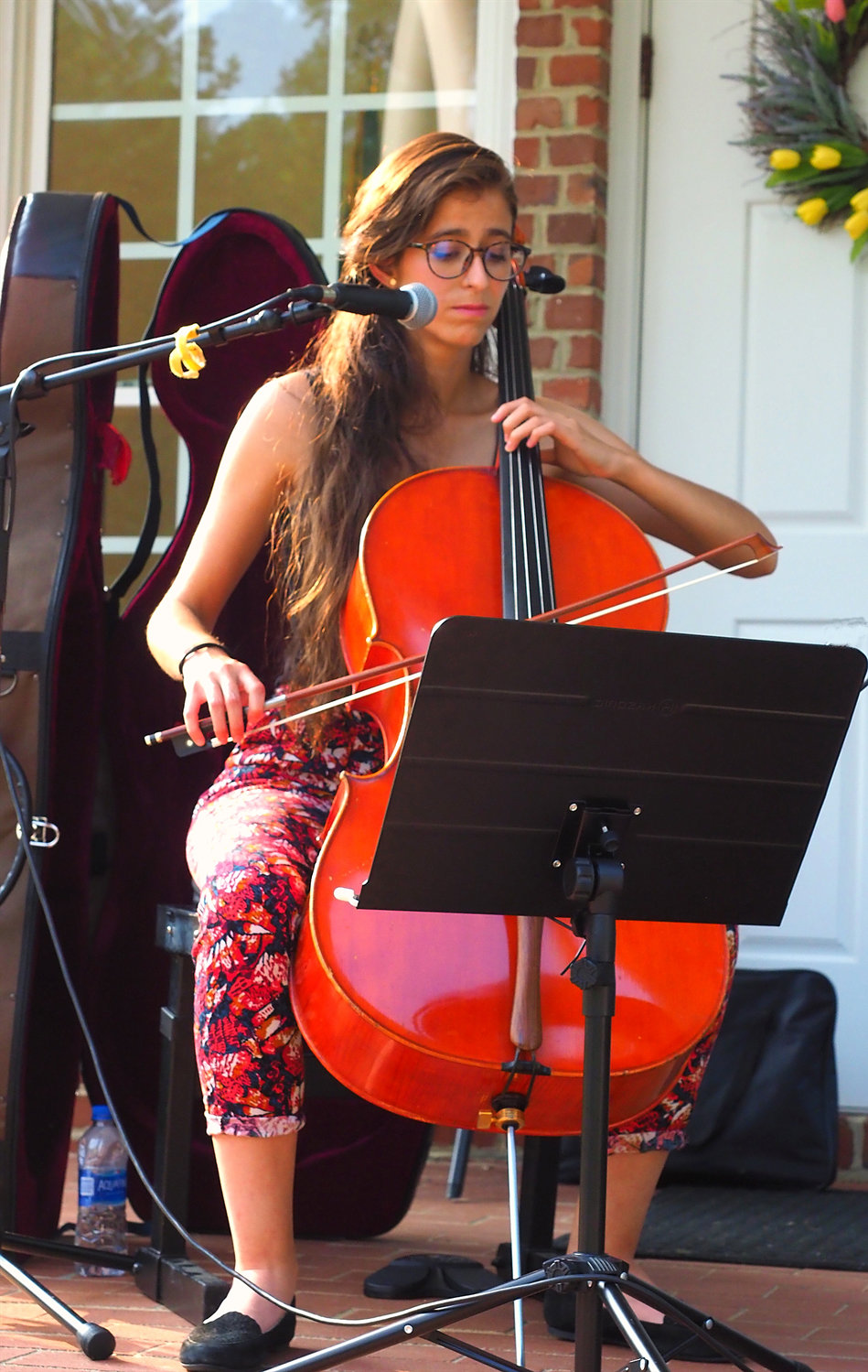 Cellist Sara Vaca plays a set at Cedar Grove UMC's first 'summer fiesta' last Saturday. She, along with various other local artists provided live music for the fiesta.